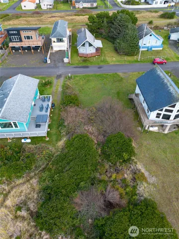 an aerial view of a house with outdoor space