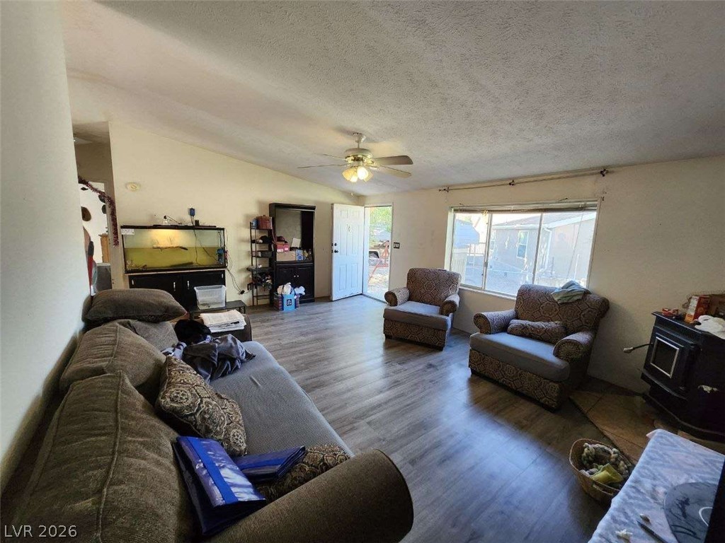 942 Holt Caliente, NV 89008 - Photo 9 of 22 A welcoming living area featuring a durable wood-look floor and natural light.