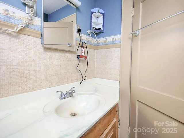 a bathroom with a sink and a tub