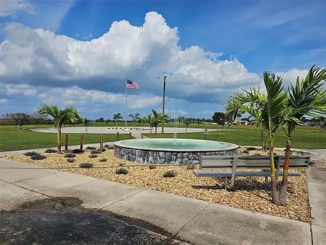 a view of a park with lots of green space