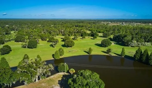 a view of a lake with a outdoor space