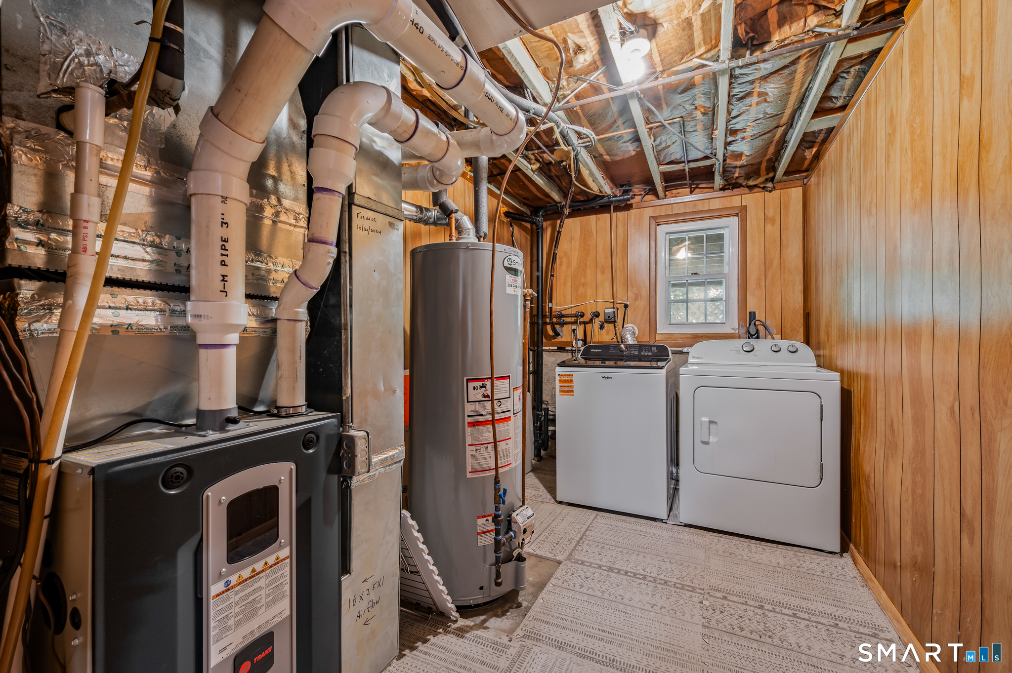 1611 Shepard Avenue Hamden, CT 06518 - Photo 24 of 31 a view of a storage room with washer and dryer