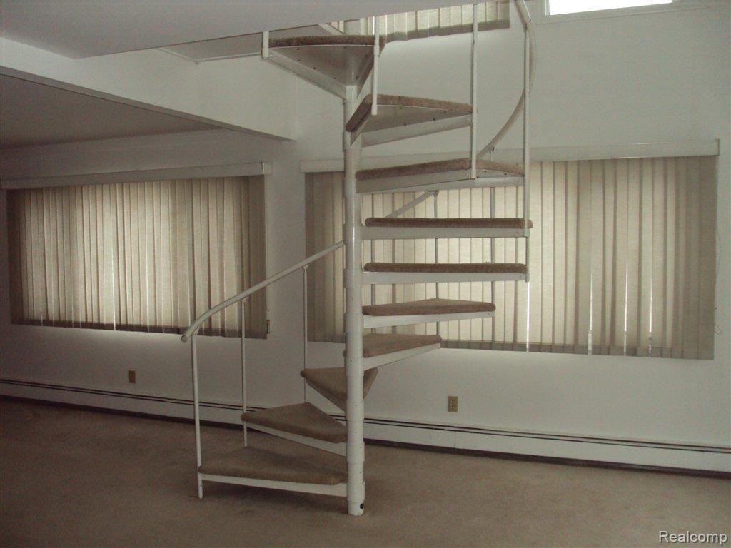 1629 Ridge Road Highland, MI 48356 - Photo 16 of 16 Stairs to loft.jpg