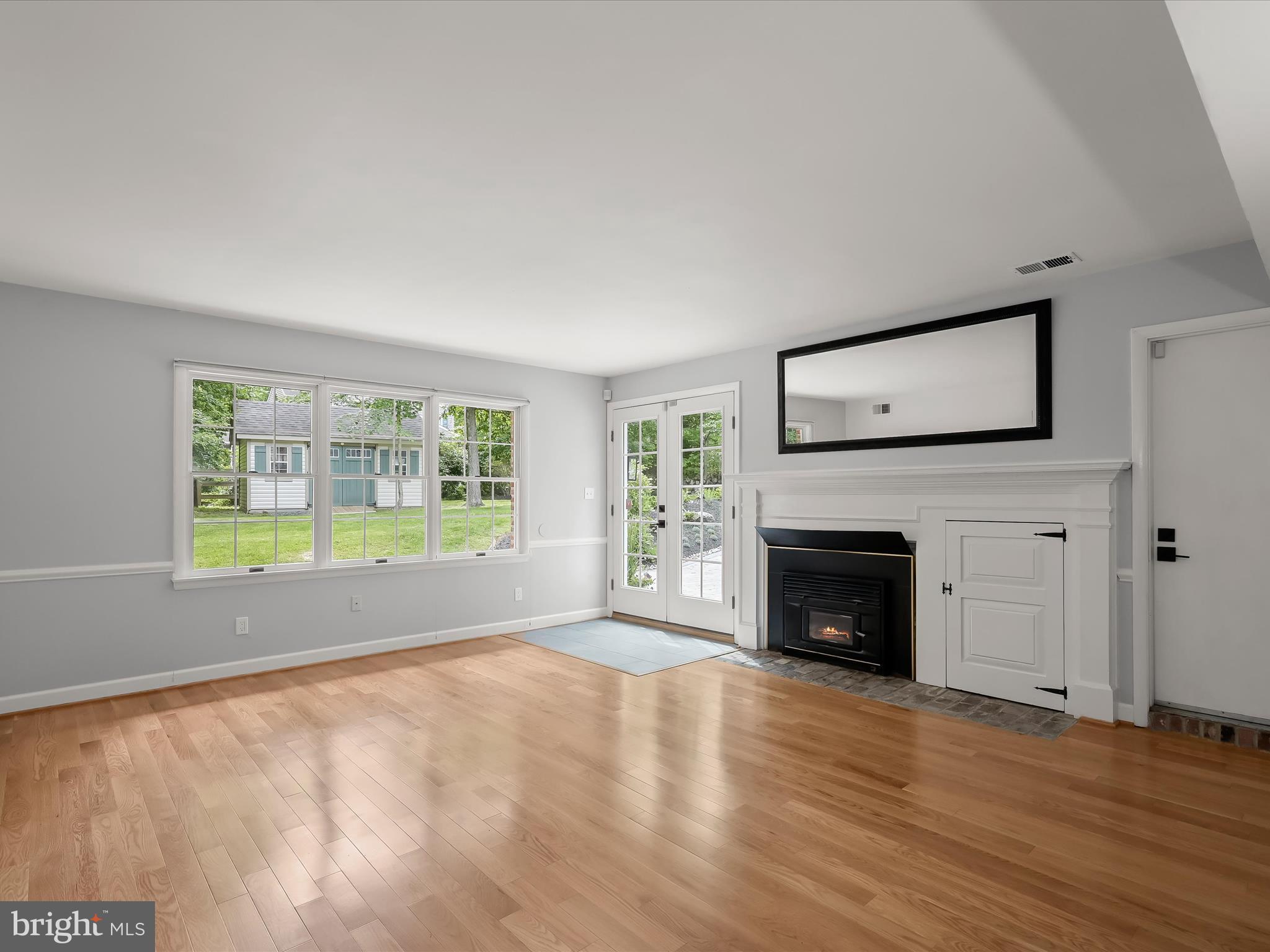 12402 Benson Branch Road Ellicott City, MD 21042 - Photo 29 of 77 Family Room - Fireplace - Hardwood Floors