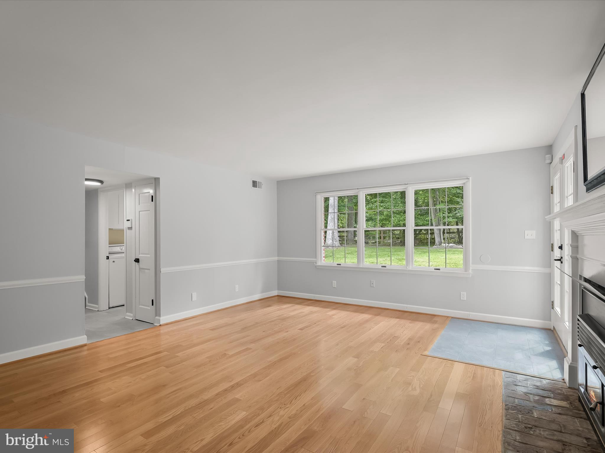 12402 Benson Branch Road Ellicott City, MD 21042 - Photo 30 of 77 Family Room - Fireplace - Hardwood Floors