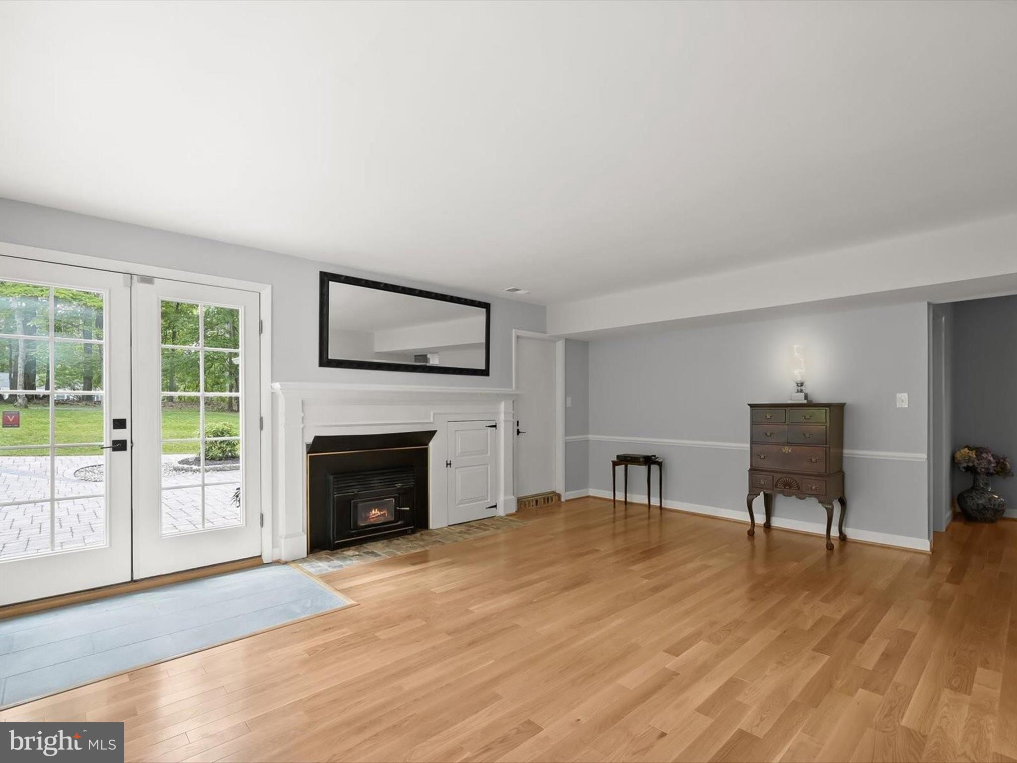 12402 Benson Branch Road Ellicott City, MD 21042 - Photo 31 of 77 Family Room - Fireplace - Hardwood Floors