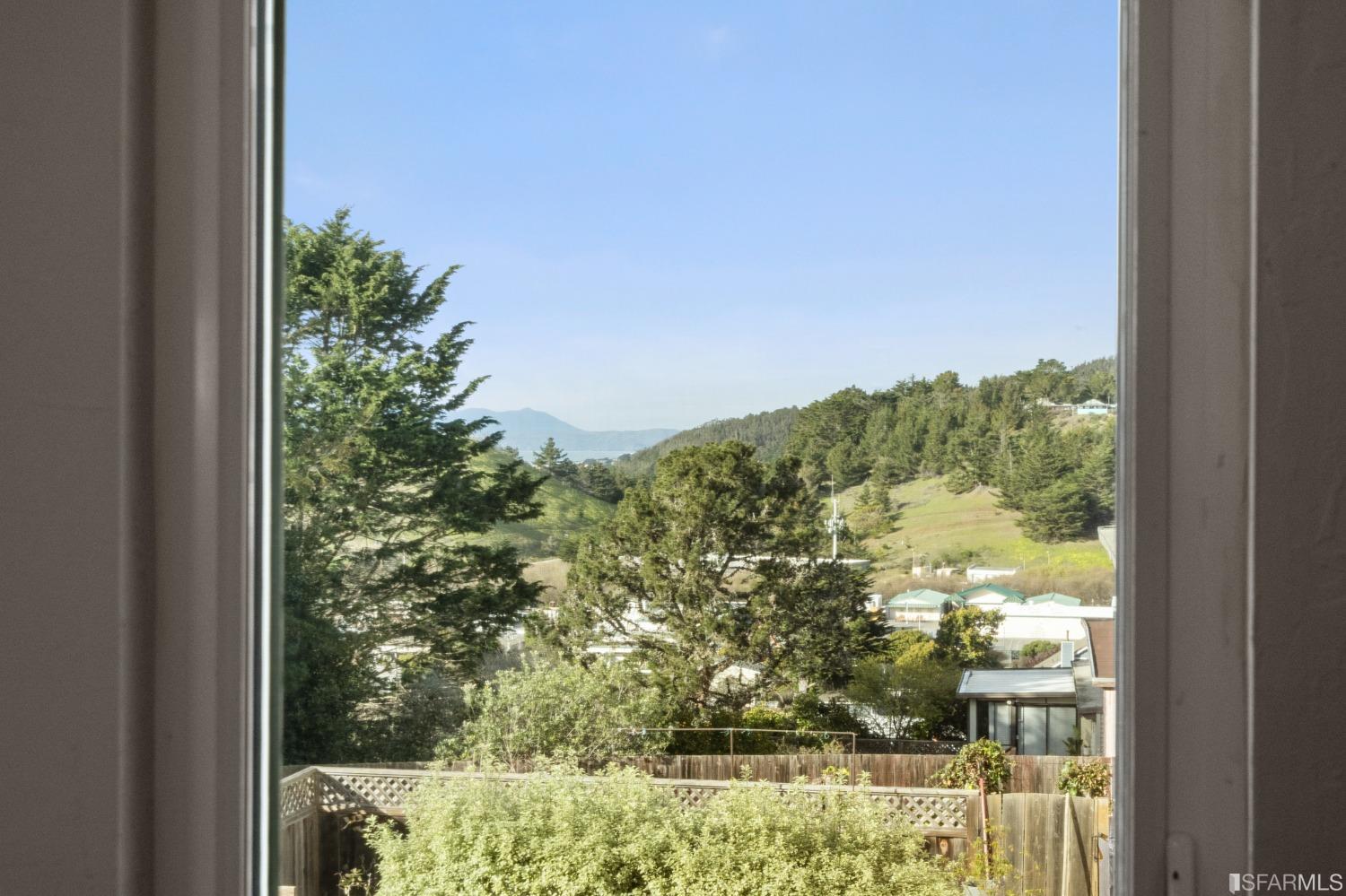 296 Reichling Avenue Pacifica, CA 94044 - Photo 23 of 39 a view of a garden from a window
