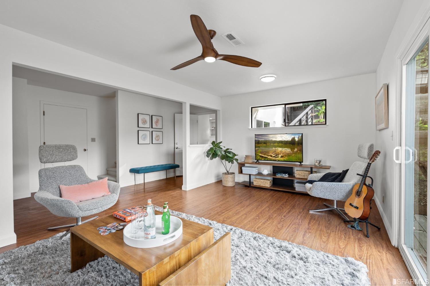 296 Reichling Avenue Pacifica, CA 94044 - Photo 24 of 39 a living room with furniture and a flat screen tv