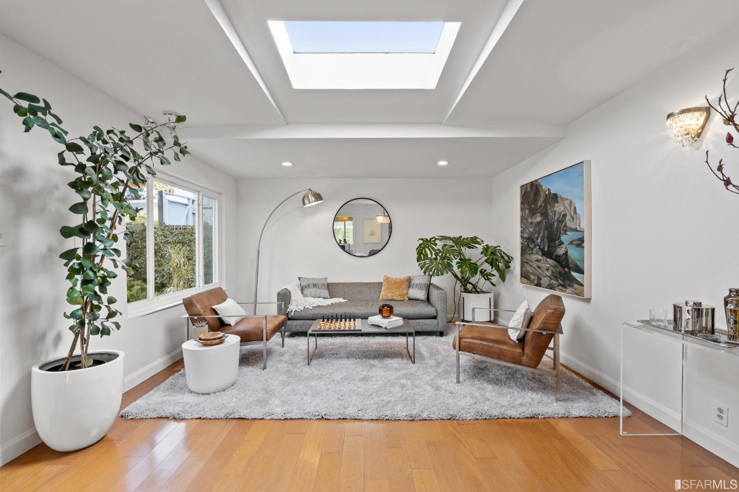 296 Reichling Avenue Pacifica, CA 94044 - Photo 3 of 39 a living room with furniture and a potted plant