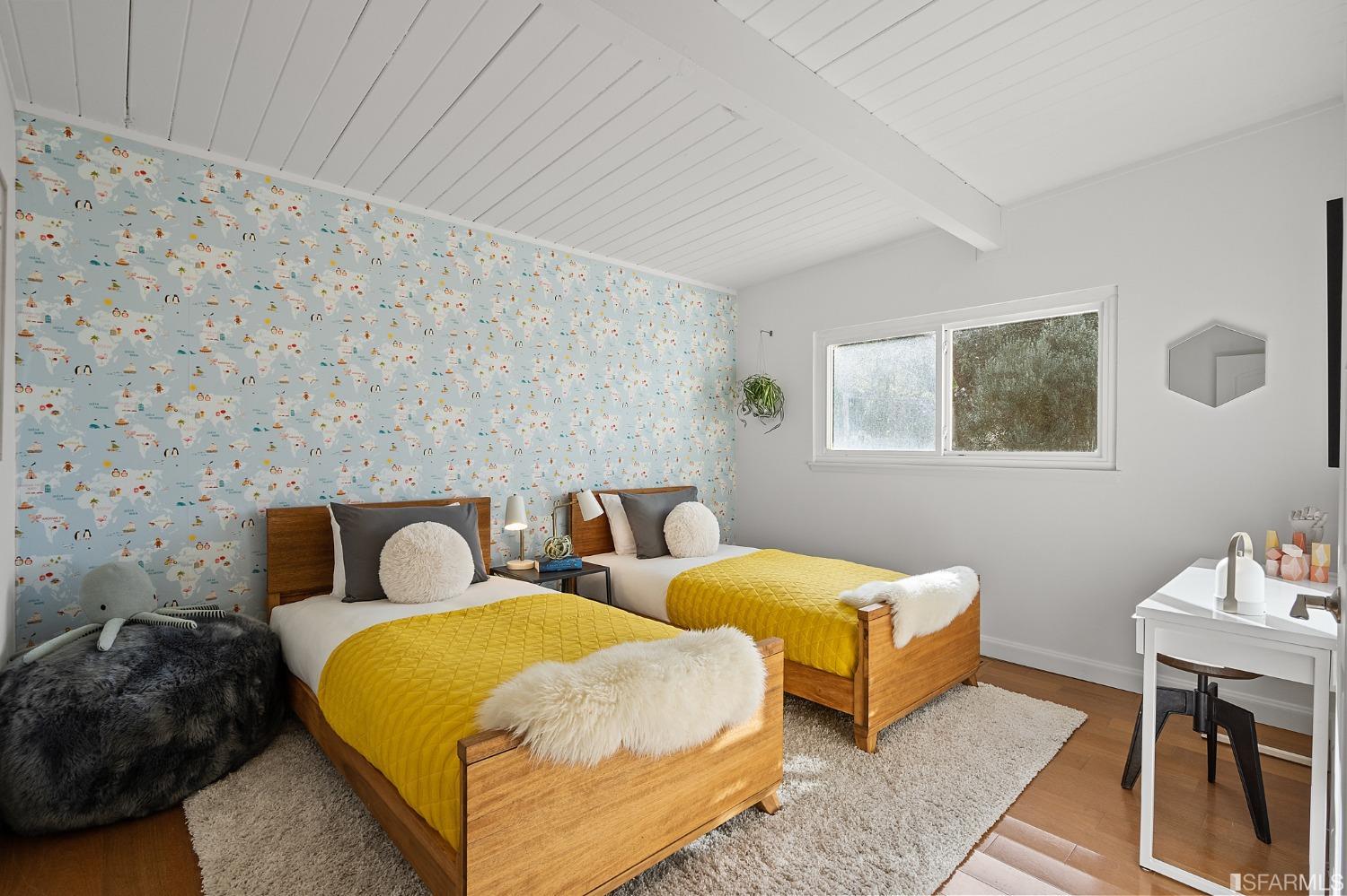 296 Reichling Avenue Pacifica, CA 94044 - Photo 10 of 39 a bedroom with two beds and painting on the wall