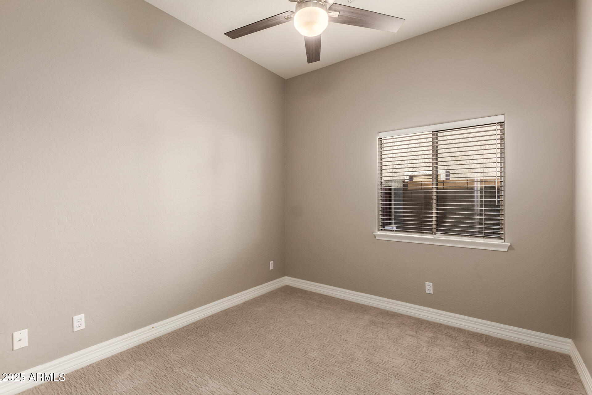 16607 North 50th Way Scottsdale, AZ 85254 - Photo 18 of 24 an empty room with a window