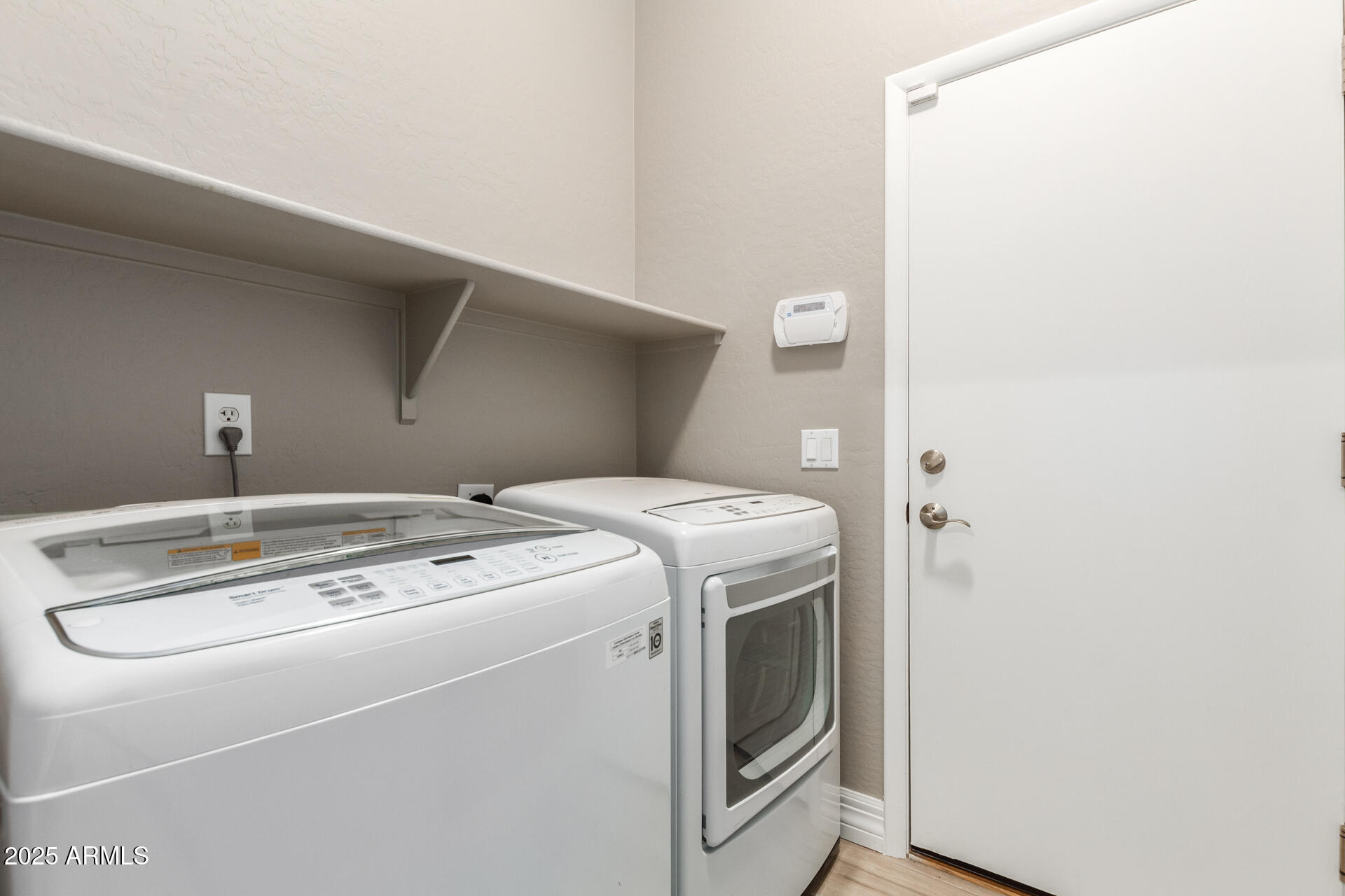 16607 North 50th Way Scottsdale, AZ 85254 - Photo 20 of 24 a utility room with dryer and washer