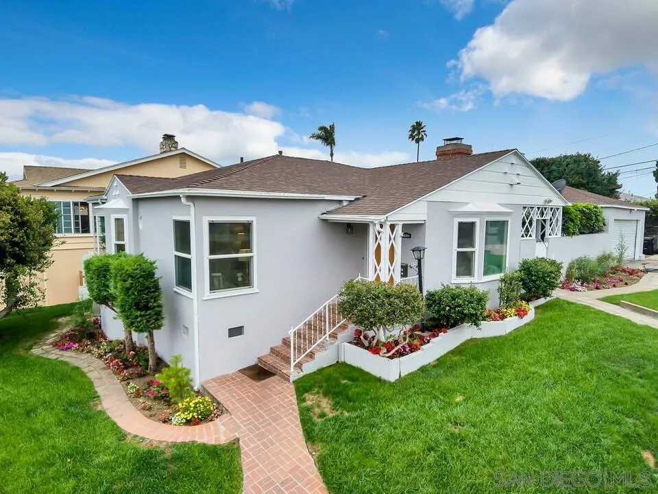 7501 Earldom Avenue Playa del Rey, CA 90293 - Photo 8 of 12 a front view of a house with a garden