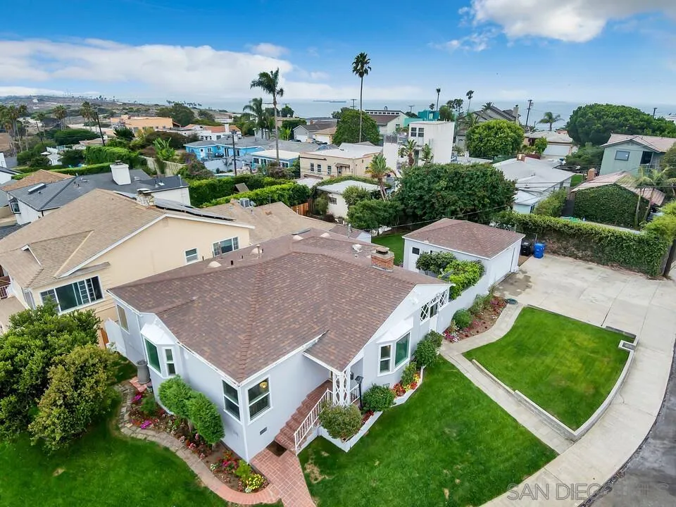 7501 Earldom Avenue Playa del Rey, CA 90293 - Photo 9 of 12 an aerial view of residential houses with yard and ocean view