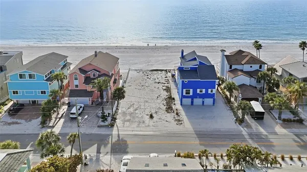 an aerial view of a house with outdoor space