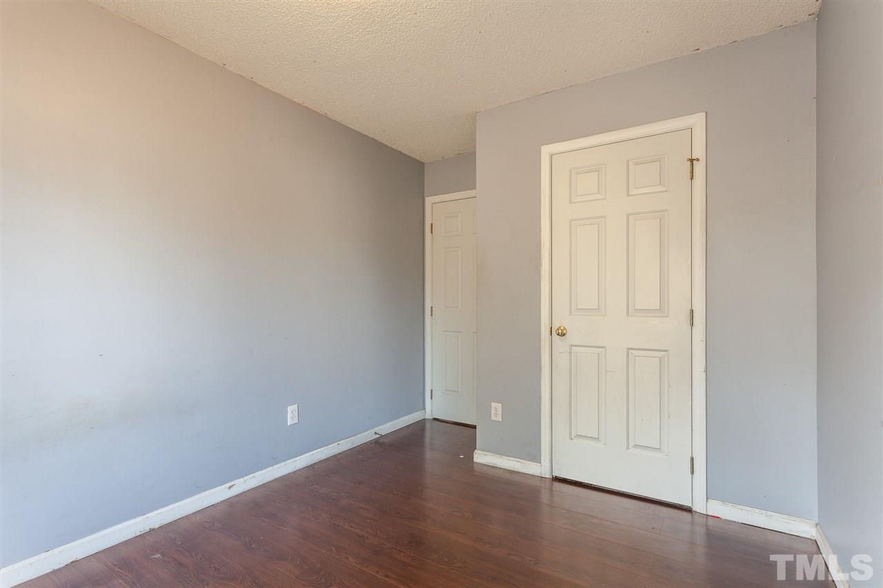 2309 Havering Place Raleigh, NC 27604 - Photo 19 of 23 an empty room with wooden floor