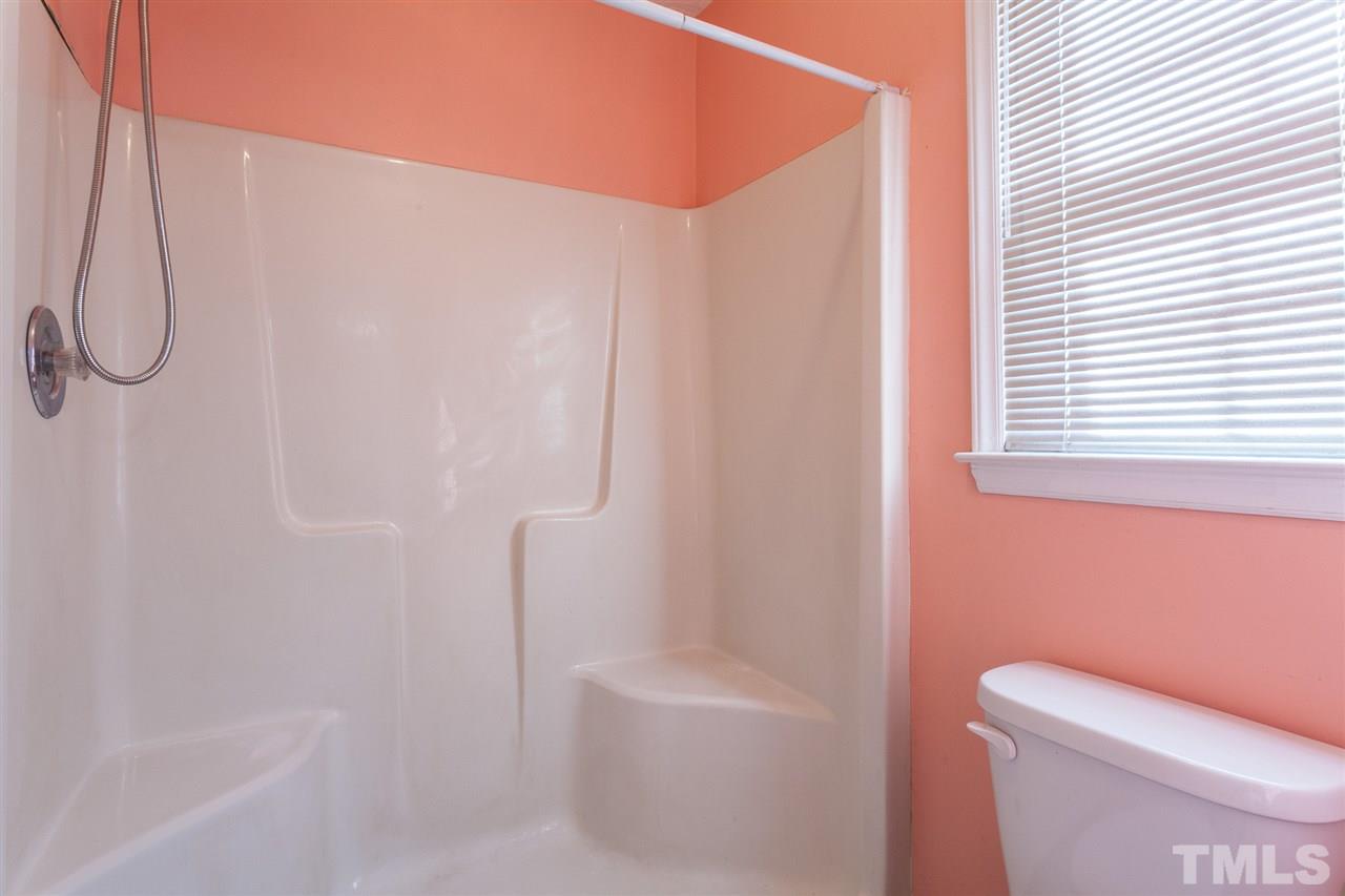 2309 Havering Place Raleigh, NC 27604 - Photo 20 of 23 a bathroom with a shower and a toilet