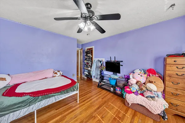 a bathroom with a sink mirror and vanity