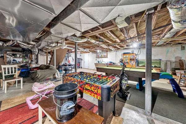 a view of a house with a snow in the yard