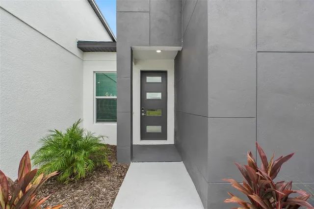 a front view of a house with a hallway