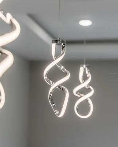 a large kitchen with kitchen island a sink dishwasher stove and white cabinets