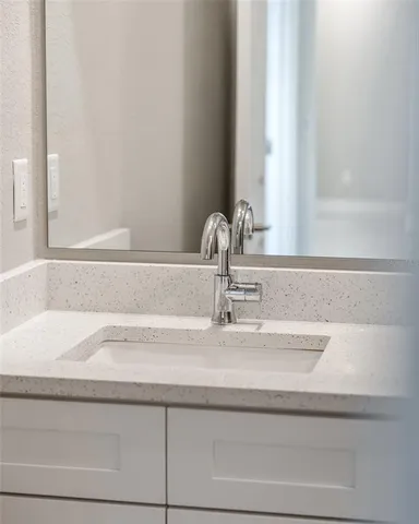 a bathroom with a sink and a toilet