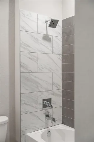 a bathroom with a sink and vanity