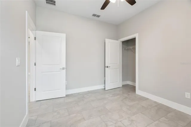 a view of an empty walk in closet