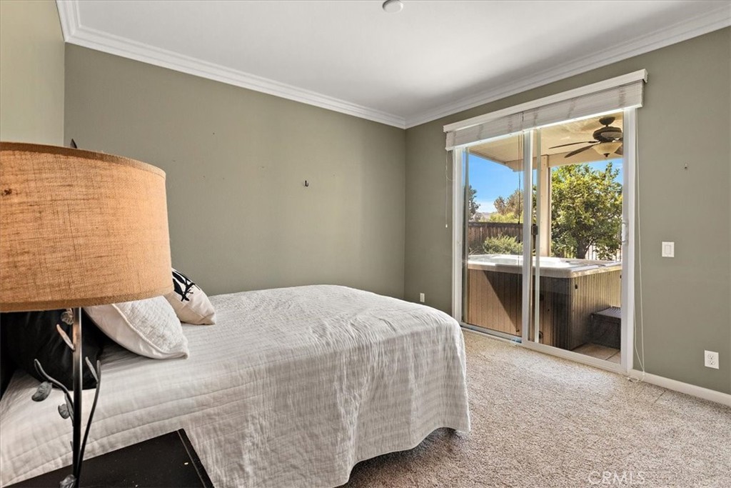 3152 Vista Terrace Riverside, CA 92503 - Photo 40 of 55 a bedroom with a bed and wooden floor