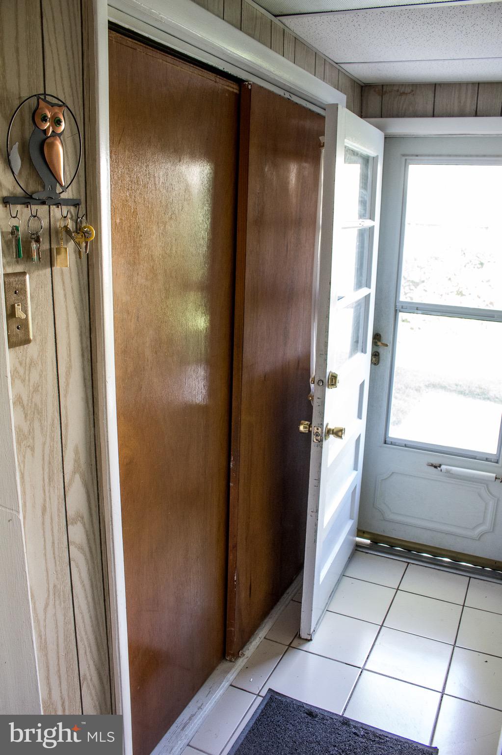 66 Nassau Road Lumberton, NJ 08048 - Photo 8 of 25 Driveway entrance with coat closet behind kitchen