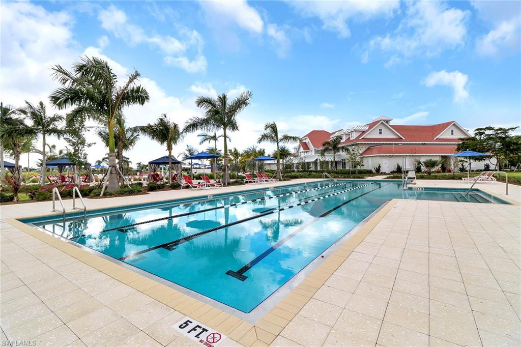 5782 Highbourne Drive Naples, FL 34113 - Photo 24 of 31 a view of swimming pool with lounge chair