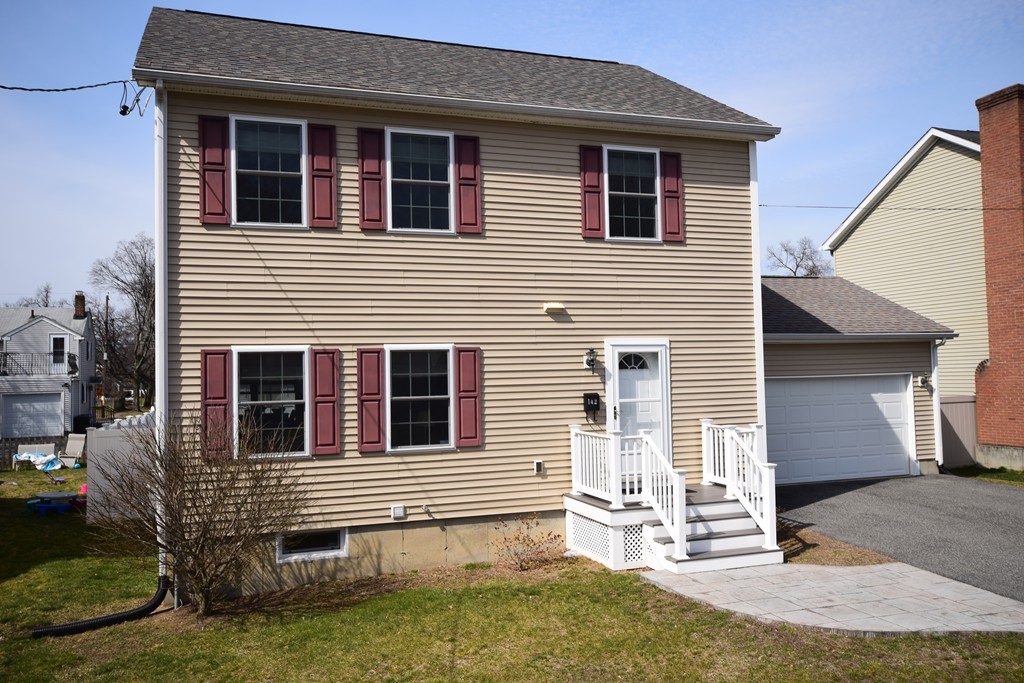 142 Benz Street Springfield, MA 01118 - Photo 28 of 30 a view of a house with a yard