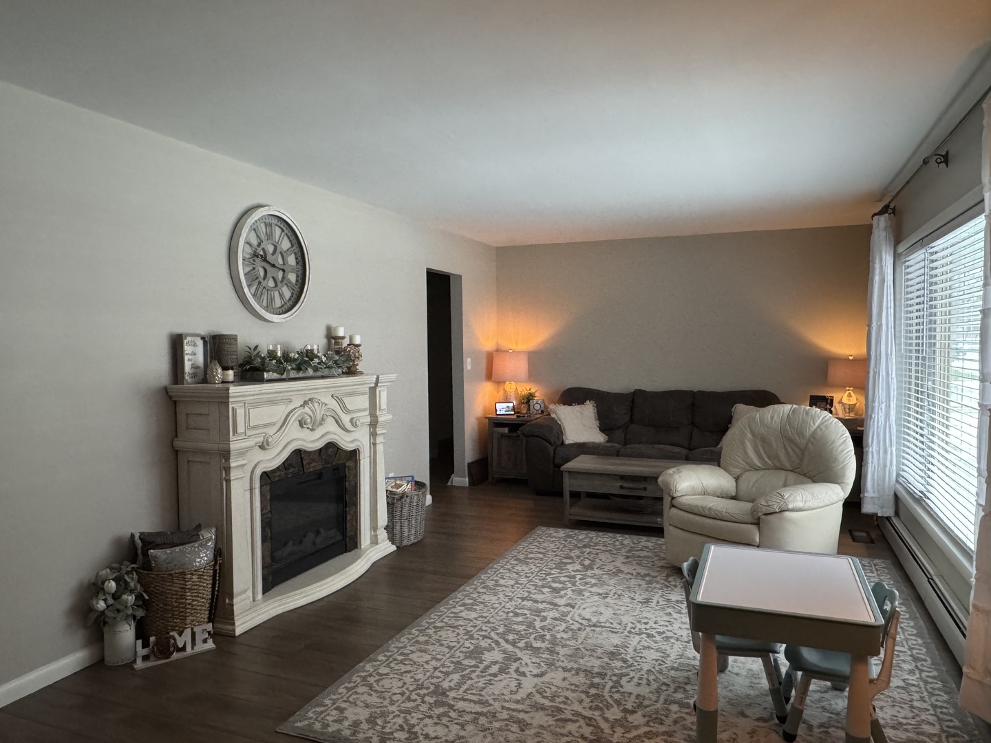 602 North Maple Street Herscher, IL 60941 - Photo 2 of 25 a living room with furniture and a fireplace