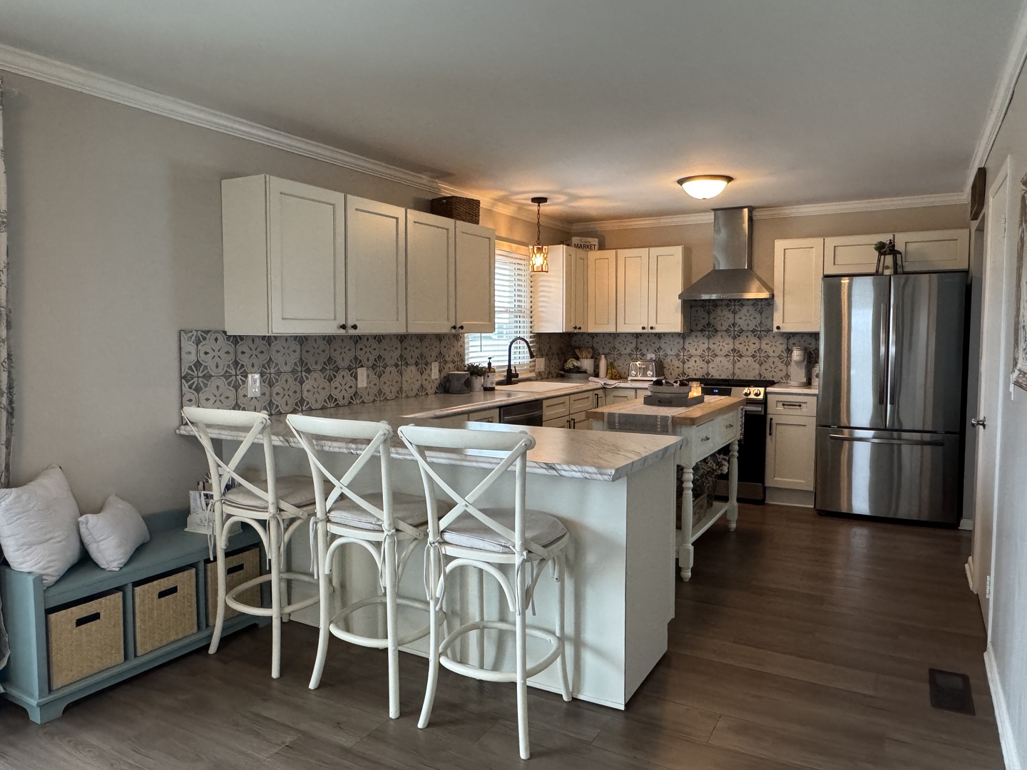 602 North Maple Street Herscher, IL 60941 - Photo 9 of 25 a kitchen with stainless steel appliances a sink a stove a refrigerator cabinets and a dining table