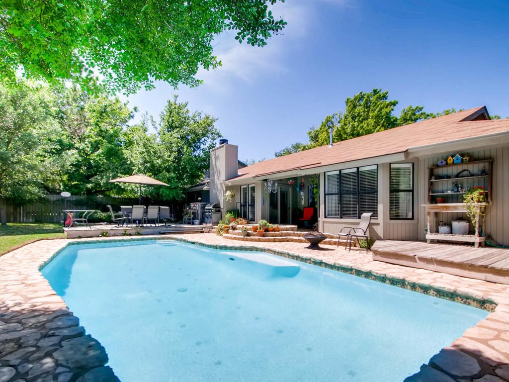 11511 D-K Ranch Road Austin, TX 78759 - Photo 1 of 1 Beautiful backyard with pool, hot tub, decks, covered patio, and plenty of yard space for entertaining!