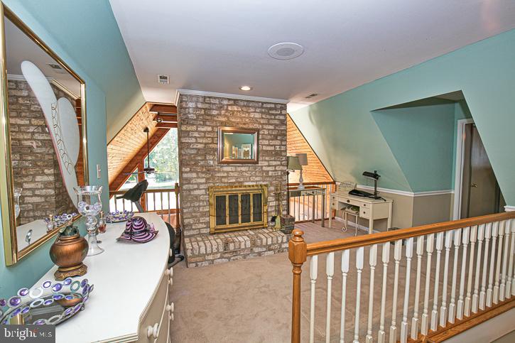 6090 Massey Crossing Road Willards, MD 21874 - Photo 54 of 97 2nd floor fireplace in the loft