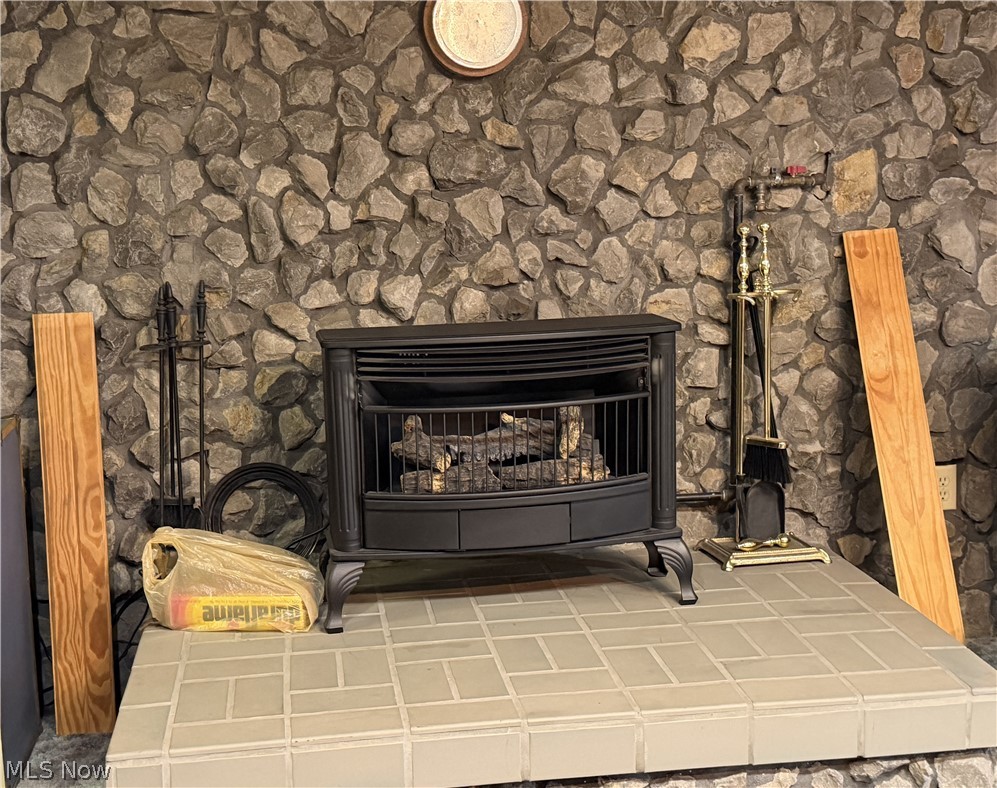 68988 Clearview Acres Road Bridgeport, OH 43912 - Photo 25 of 26 Propane stove in finished basement