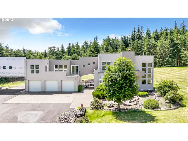 a view of a swimming pool and a yard