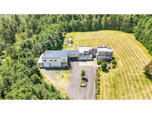 a view of a swimming pool with a yard