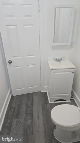 a bathroom with a toilet and a sink