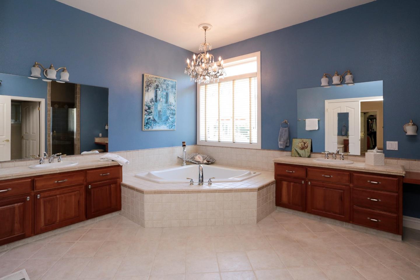 1068 Audrey Avenue Campbell, CA 95008 - Photo 15 of 47 a spacious bathroom with a tub sink and mirror