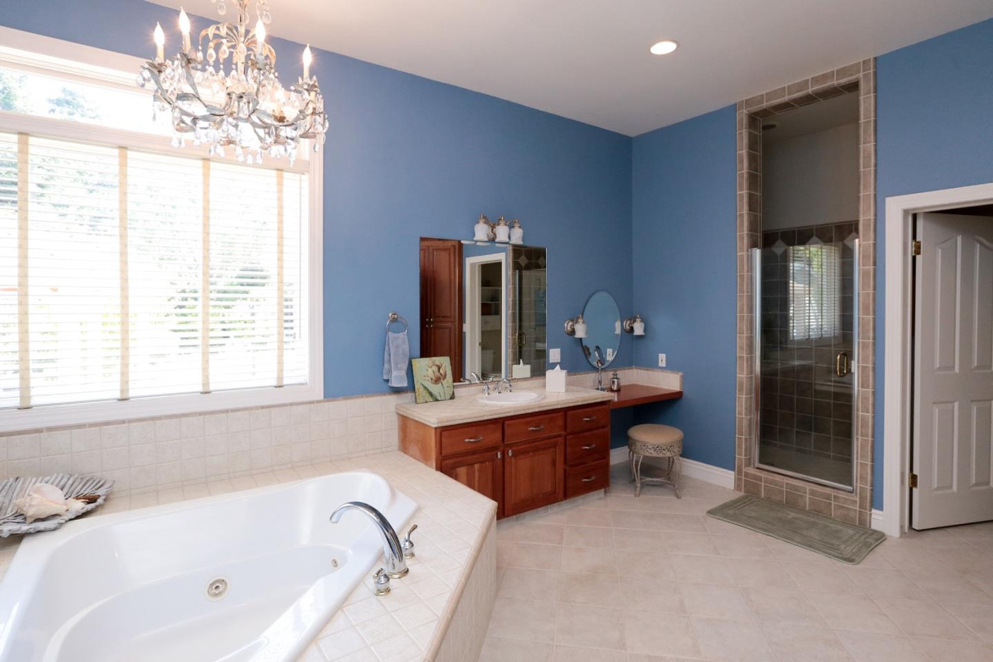 1068 Audrey Avenue Campbell, CA 95008 - Photo 16 of 47 a bathroom with a tub sink and mirror