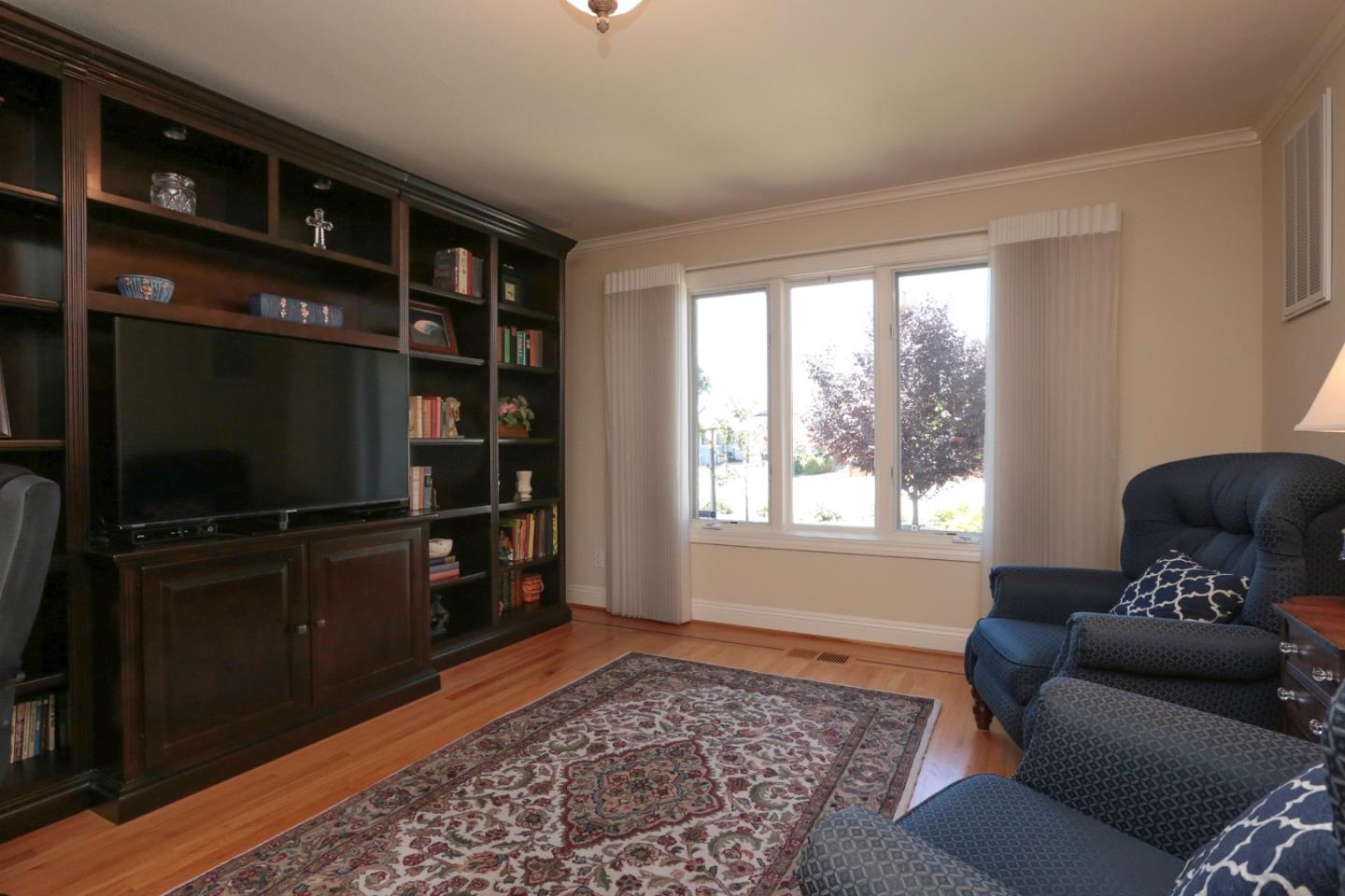 1068 Audrey Avenue Campbell, CA 95008 - Photo 18 of 47 a living room with furniture and a flat screen tv