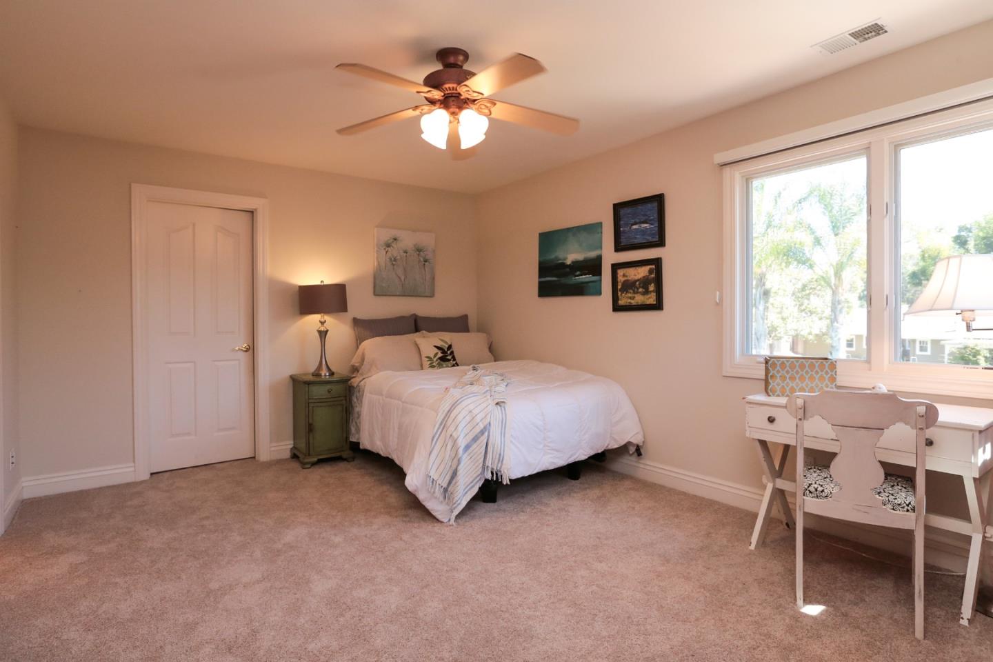 1068 Audrey Avenue Campbell, CA 95008 - Photo 26 of 47 a bedroom with a bed and a window