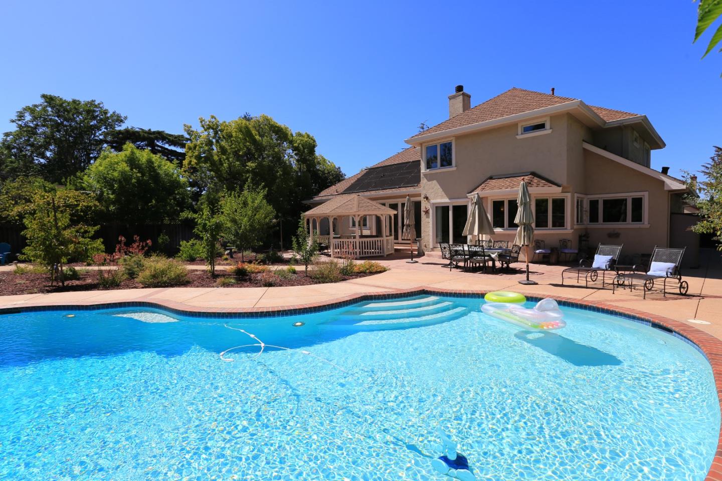 1068 Audrey Avenue Campbell, CA 95008 - Photo 27 of 47 a view of the house with swimming pool and chairs