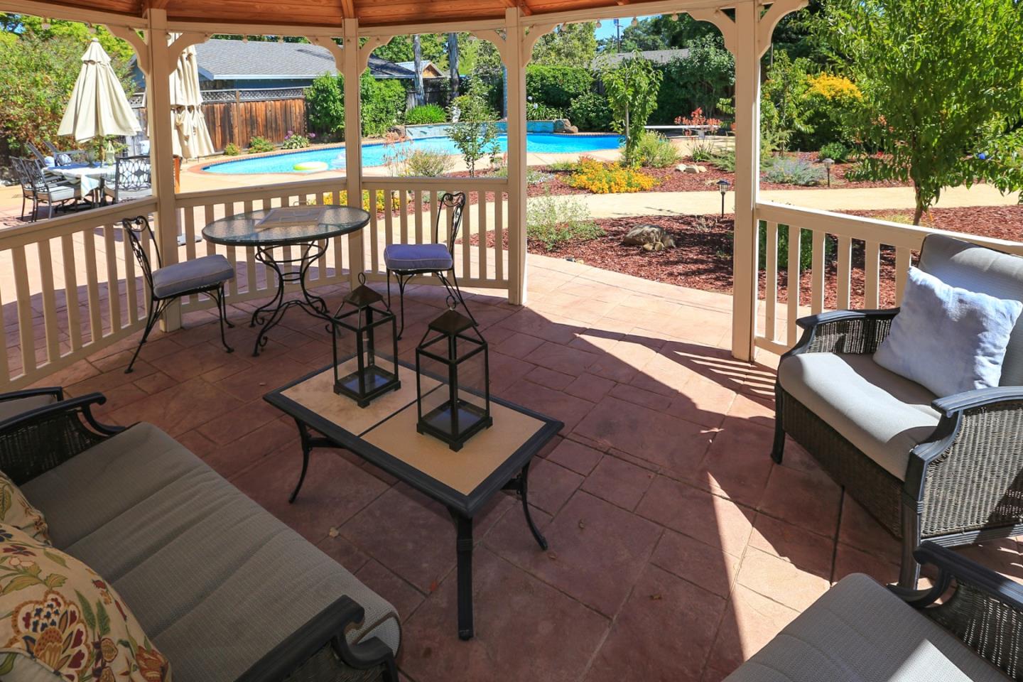 1068 Audrey Avenue Campbell, CA 95008 - Photo 28 of 47 a view of a patio with couches table and chairs