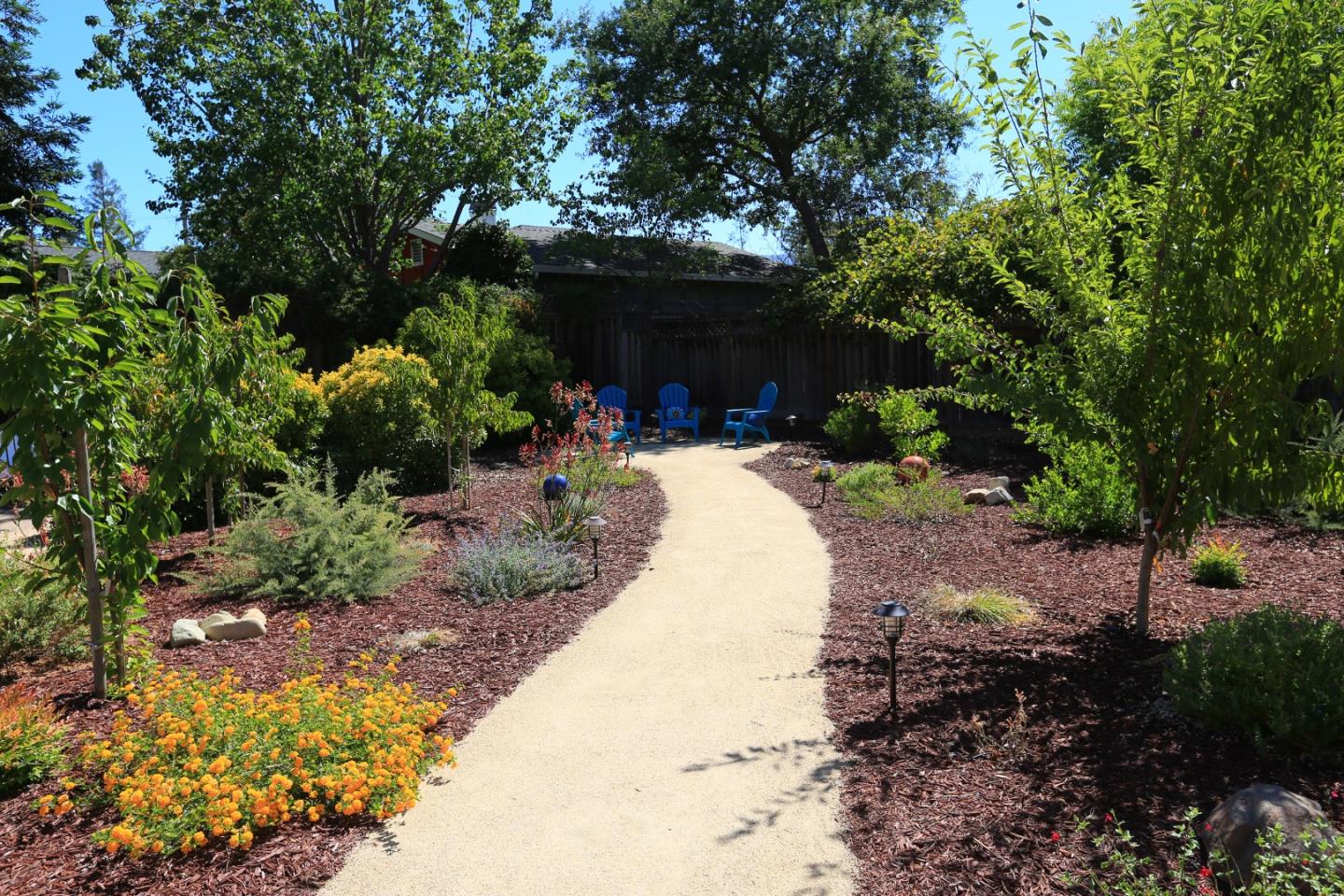1068 Audrey Avenue Campbell, CA 95008 - Photo 32 of 47 a view of a back yard with flower plants