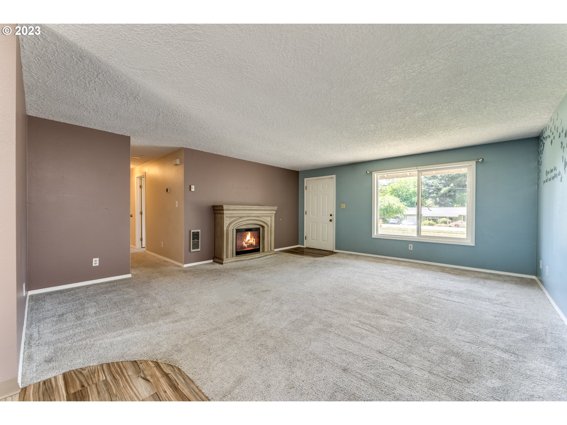 206 South 8th Avenue Ridgefield, WA 98642 - Photo 3 of 22 a view of an empty room with a window