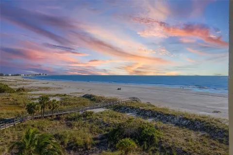 a view of an ocean and mountain