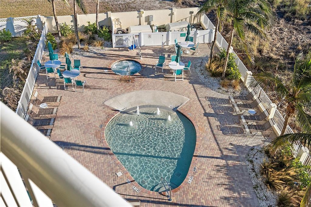 12000 Gulf Boulevard, Unit 501W Treasure Island, FL 33706 - Photo 32 of 36 swimming pool view with a outdoor seating space